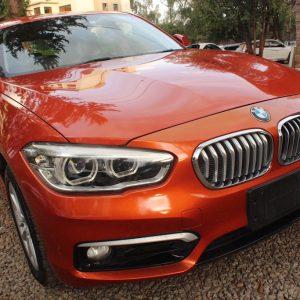 BMW 118i 1.5L 2016 Leather Sunset Orange 33,000 Kms
